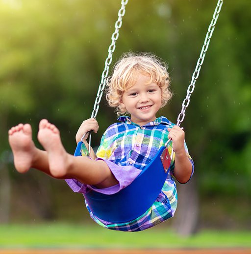 Child-on-playground.-swing-Kids-play-outdoor.